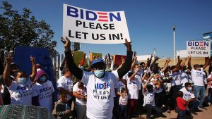 Mexico-migrants-Biden-sign