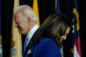 WILMINGTON, DE - AUGUST 12: Presumptive Democratic presidential nominee former Vice President Joe Biden invites his running mate Sen. Kamala Harris (D-CA) to the stage to deliver remarks at the Alexis Dupont High School on August 12, 2020 in Wilmington, Delaware. Harris is the first Black woman and first person of Indian descent to be a presumptive nominee on a presidential ticket by a major party in U.S. history. (Photo by Drew Angerer/Getty Images)