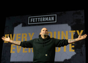 ERIE, PA - AUGUST 12: Democratic Senate candidate Lt. Gov. John Fetterman (D-PA) is welcomed on stage during a rally at the Bayfront Convention Center on August 12, 2022 in Erie, Pennsylvania. Fetterman made his return to the campaign trail in Erie after recovering from a stroke he suffered in May. (Photo by Nate Smallwood/Getty Images)